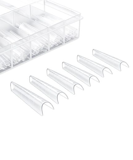 Clear plastic pill organizer with divided compartments and six detachable curved sleeves laid out nearby