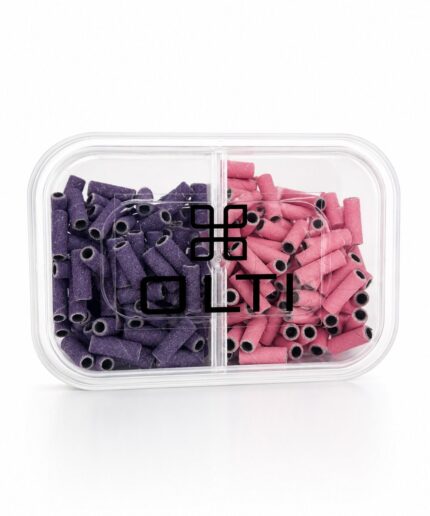 Clear plastic two-compartment container filled with purple and pink hollow-tube snacks; brand logo on lid.