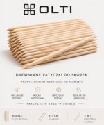 Stack of natural wooden cuticle sticks with OLTI logo, advertising professional manicure tools (Polish text).