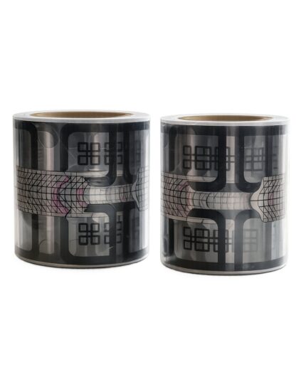 Two rolls of decorative black patterned tape with geometric grid motifs and abstract shapes, standing side by side on a white background.